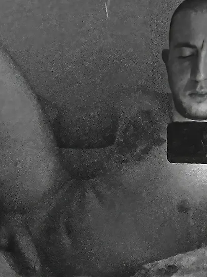 naked guy checking his phone