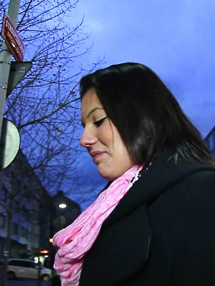 Brunette black coat pink