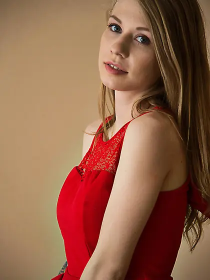 Beautiful blonde Eva Gold takes off her red dress and heels