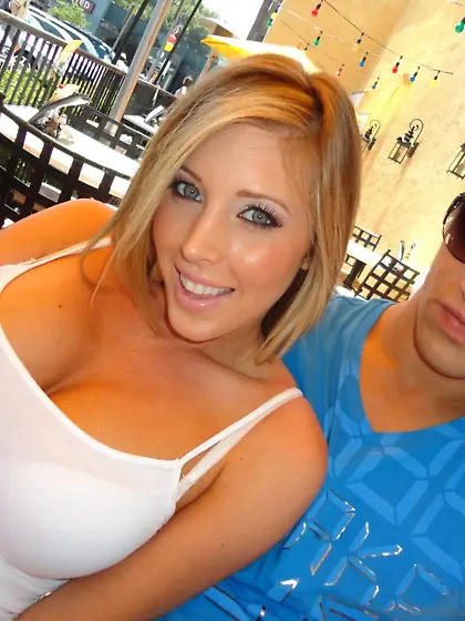 Blue-eyed blonde with round tits gets fucked on a big messy bed