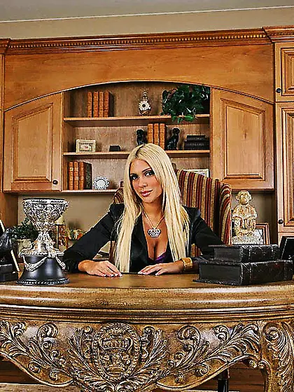 Alluring classy blonde Carmel Moore strips her slutty clothes an