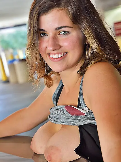 Attractive college babe with a firm ass is exposing her bare ass