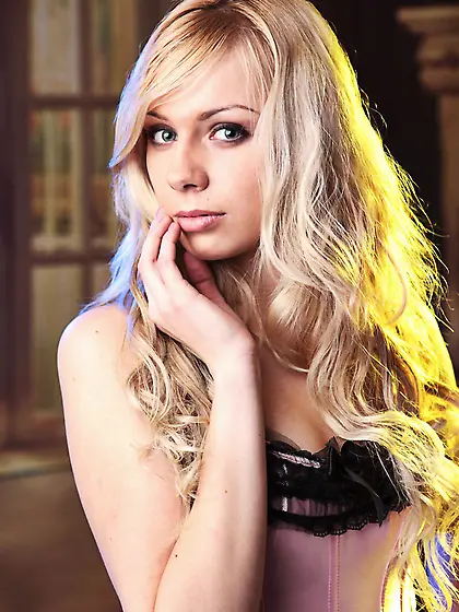 Dani is smoking-hot in her pink corset today.