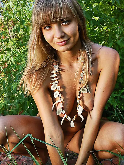Cute blonde teen Enja Femjoy has some naked outdoor fun making j
