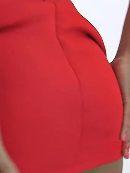 High-heeled brunette sits dildo