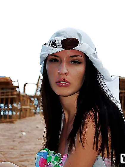 Brunette babe poses barely clothed teasing on pool table