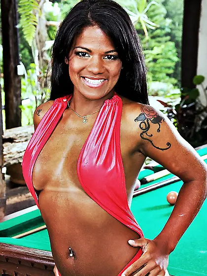 Slutty ebony hoe Emily Brasil strips her slutty dress and shows