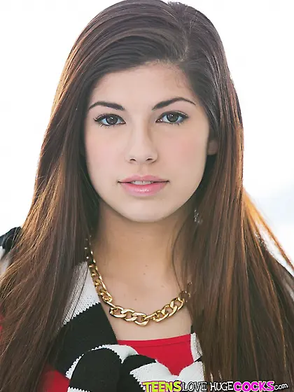 Clothed brunette girl Ava Taylor strips and poses naked