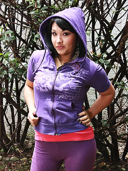 Sporty Hispanic girl showing off her round ass and natural tits