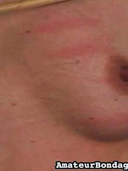 Red sofa curly-haired babe