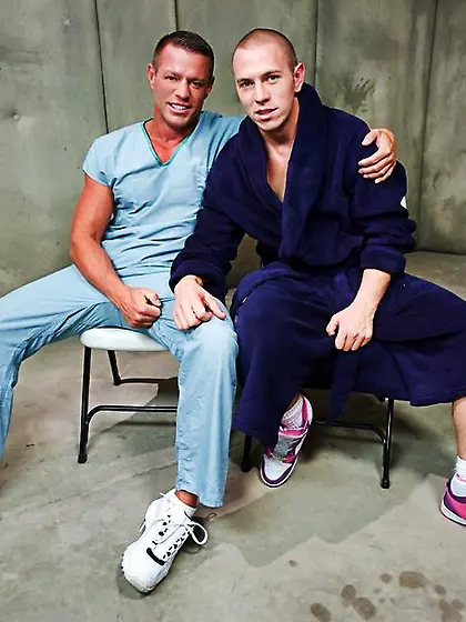 Enchained suspended guy spanked