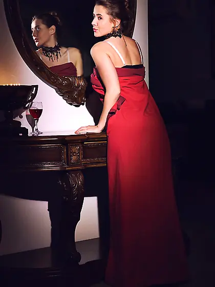 Elegant woman comes home at night and gets nude to warm up waiti