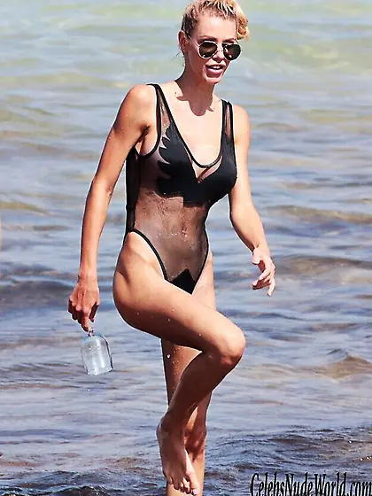 Lisa Hochstein Gets Wet In A See Though Bodysuit