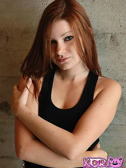 Cute redhead teen kori Kitten teases us wearing little mini skir