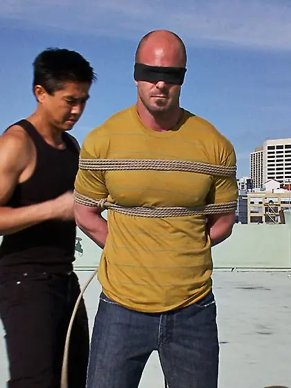 Blindfolded tied dude butt