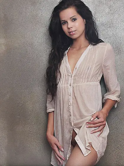 Petite long haired brunette Jessica Koks with bald pussy and tin