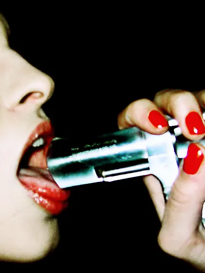 Gun sucking hottie