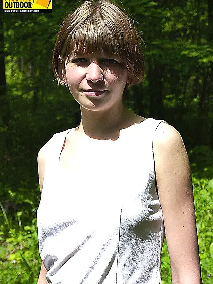 Pissing outdoor in the forest of naked teen girl