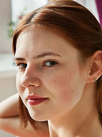 Redhead dressed in red shows her immaculate labia up close on ca