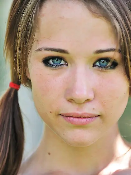 Pigtailed schoolgirl using a garden hose to fuck herself for the