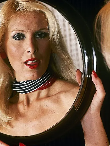 Indulging blonde wearing red