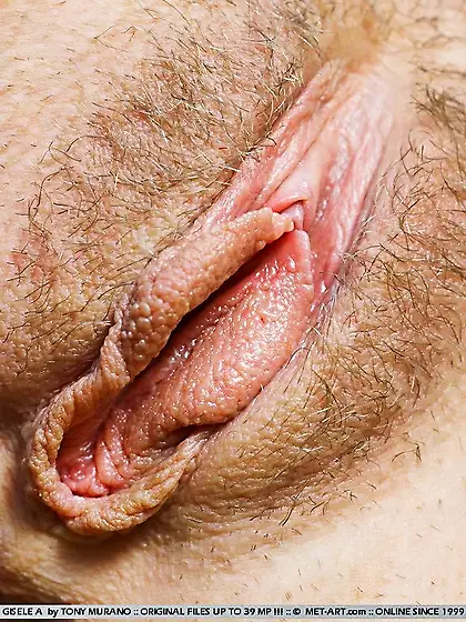 Naughty blonde teen Olga Barz bares her blue outfit and thong sh