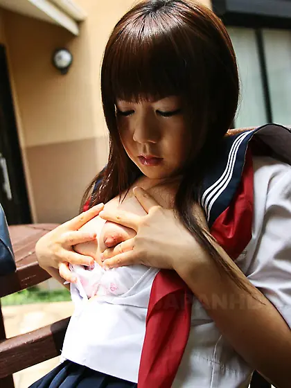 Naughty chick Shino Mizusawa fingers her oriental cunt and rubs