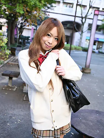 Asian girl Remika Uehara is smiling into cam while the cameraman