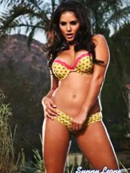 Sunny Leone takes her sexy yellow bikini outdoors and teases us