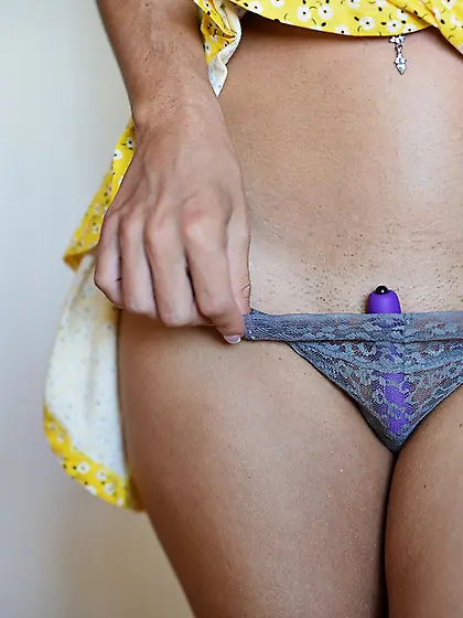 Brunette with a purple toy is ready to please herself inside her