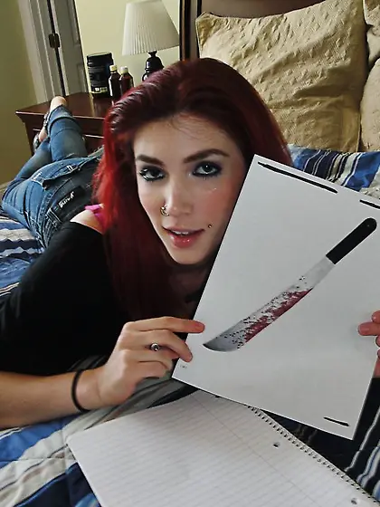 Freaky redhead darling with nasty tattoos is ready for some hot