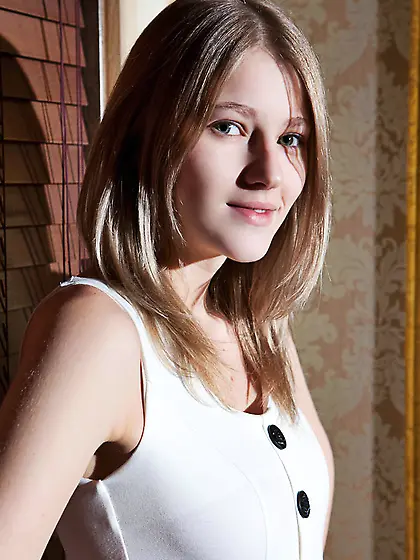 Amazing blonde seduces with her soft blue...