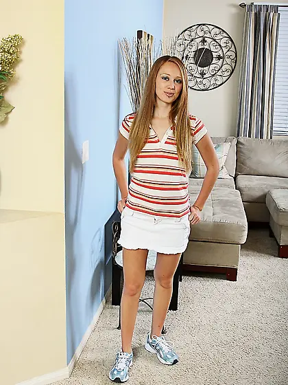 Cori Lynn  strips off her orange skin tight panties to show her