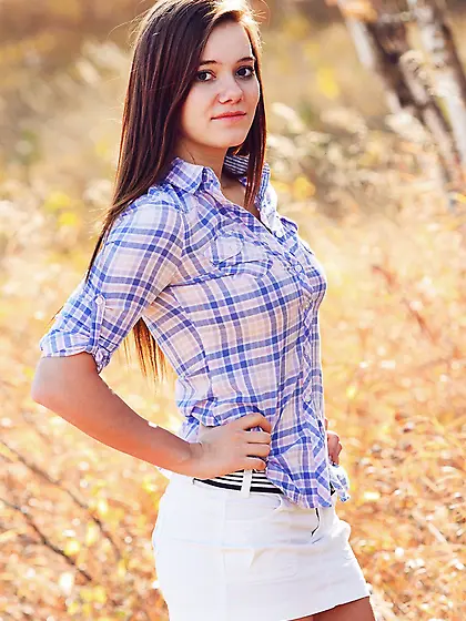 Girl next door showing her nice boobies while teasing outside