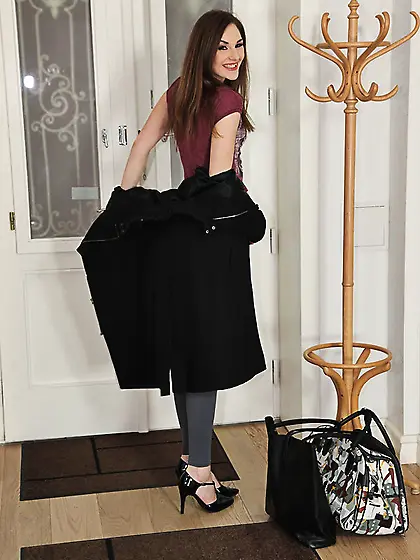 Tight pants redhead sucking cock and riding it on a big grey bed