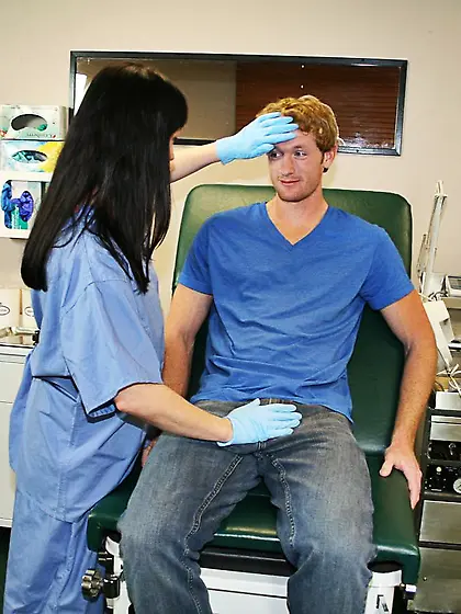 Sexy brunette nurse sucking