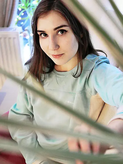 Dark-haired teen with perky tits showing that body in a wicker e