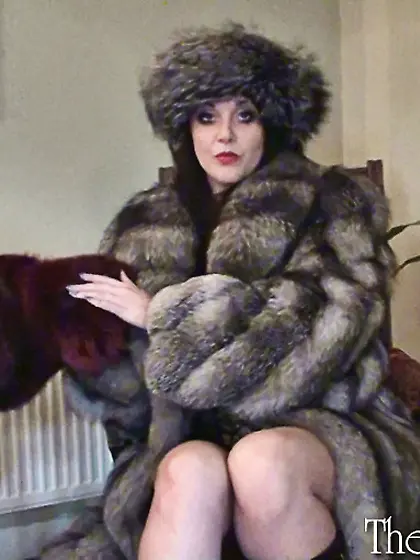 Seductive brunette MILF in silver fox coat...