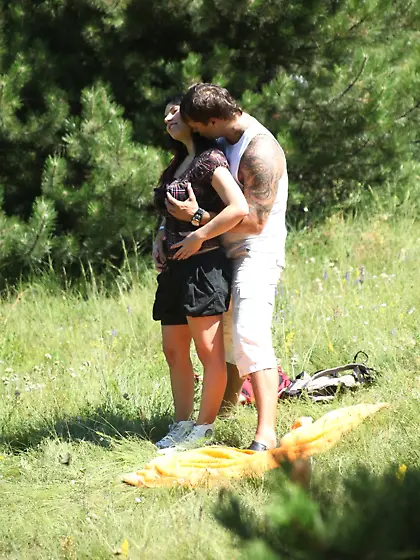 Outdoors fucking session featuring a natural busty brunette bomb