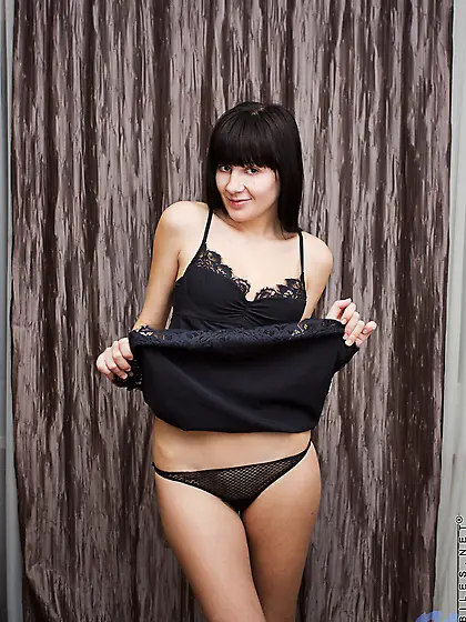 Shy looking brunette babe Becky Stone really loves posing withou