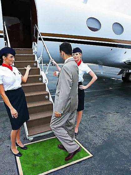 First-class service from two sexed-up flight attendants in tight