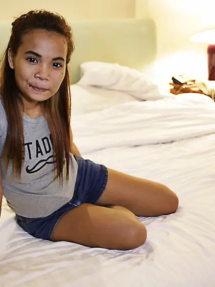 Teen Asian girl looks very cute despite the fact that she wears