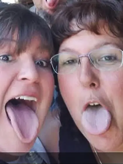 My mom and aunt.  Love those tongues