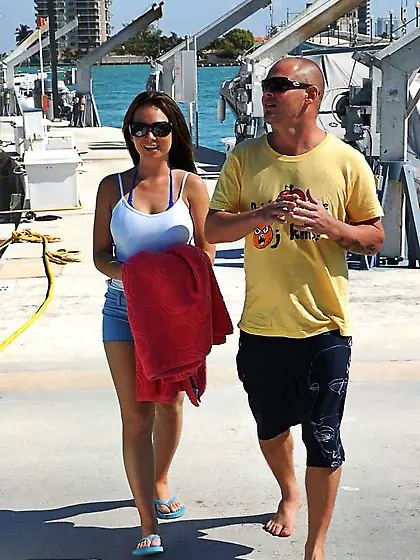 Busty brunette with a round booty gets her ass banged on a boat