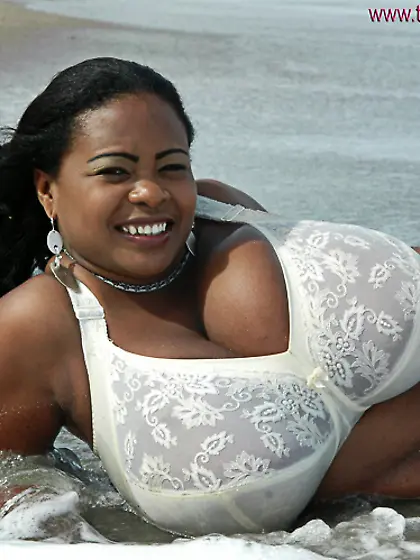 Black cutie teasing beach