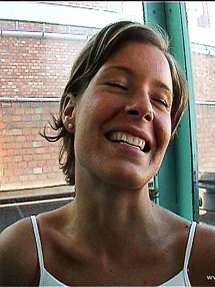 Lora Craft spreads her sexy legs before the camera and fingers h