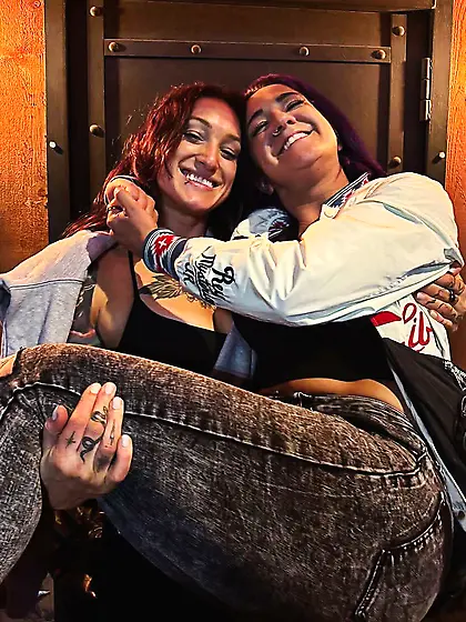 Kris Statlander holding Bayley