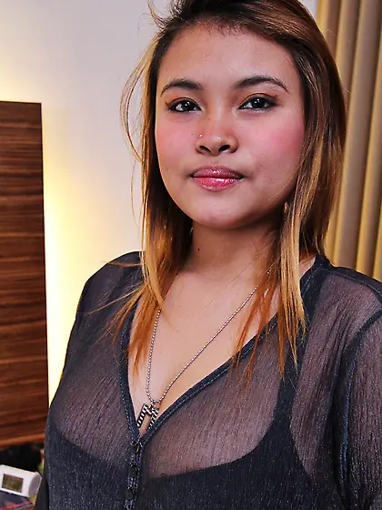 Chubby Thai girl demonstrates on camera natural boobs and sweet