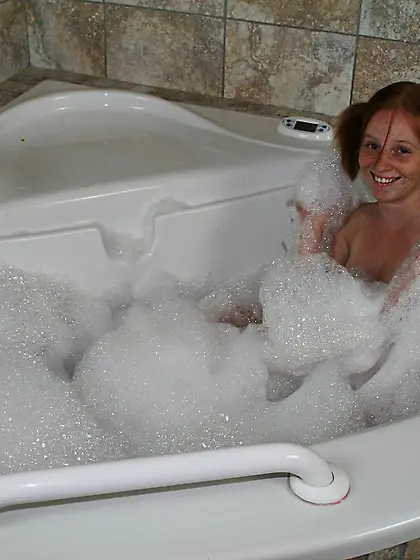 Lovely teen girl Alyssa Hart takes a bath when she's joined by a