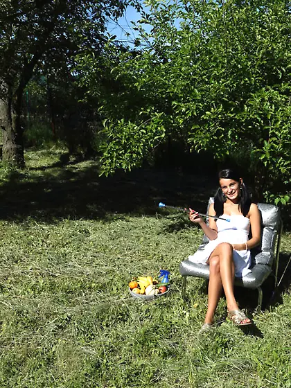 Tanned pigtailed brunette girl